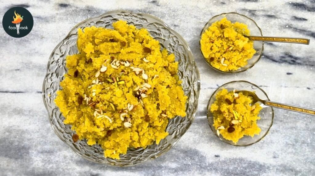 Traditional Besan Ka Halwa garnished with almonds and raisins